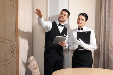 People attending professional butler courses in hotel