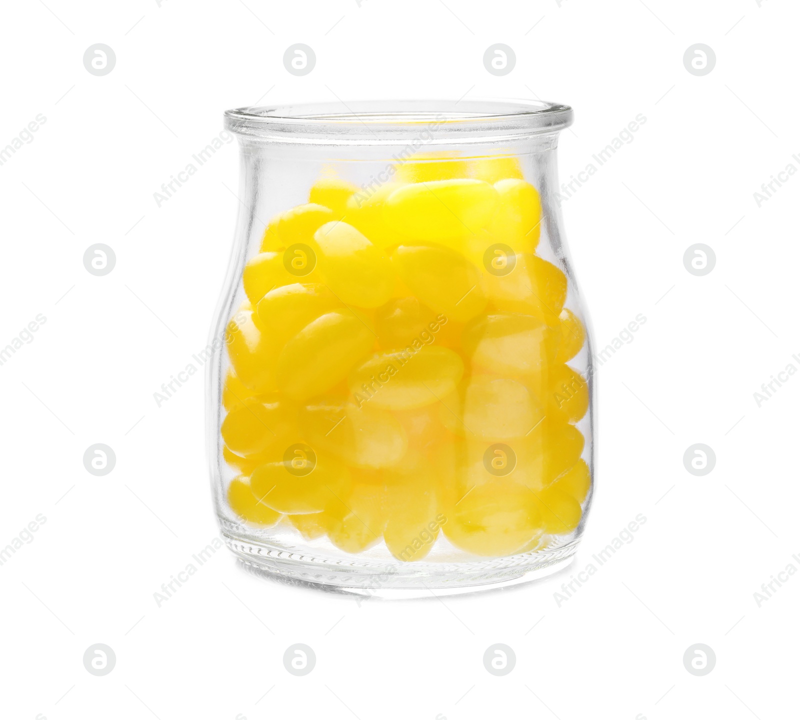 Photo of Tasty small lemon drops in glass jar isolated on white