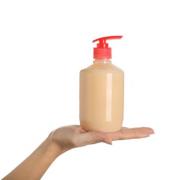 Woman holding liquid soap dispenser on white background, closeup
