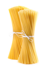 Photo of Tied uncooked Italian spaghetti isolated on white