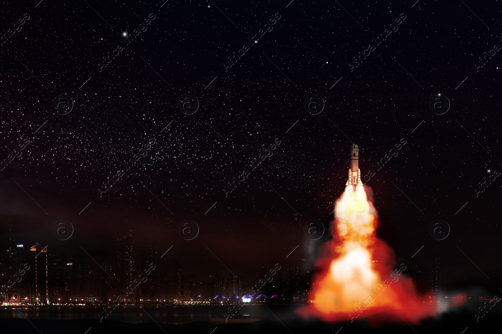 Image of Launched rocket in flight, night cityscape on background. Space mission