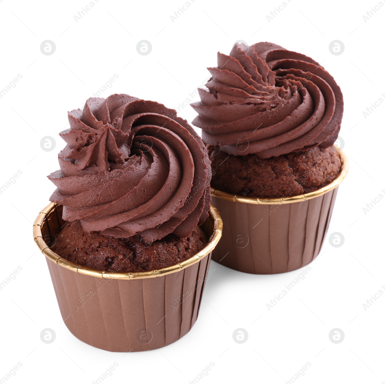 Photo of Two delicious chocolate cupcakes isolated on white