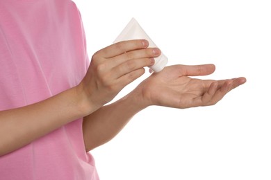 Photo of Woman applying cream on her hand against white background, closeup