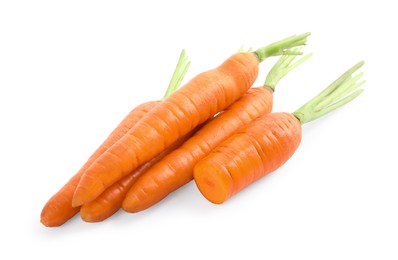 Photo of Cut and whole ripe carrots isolated on white