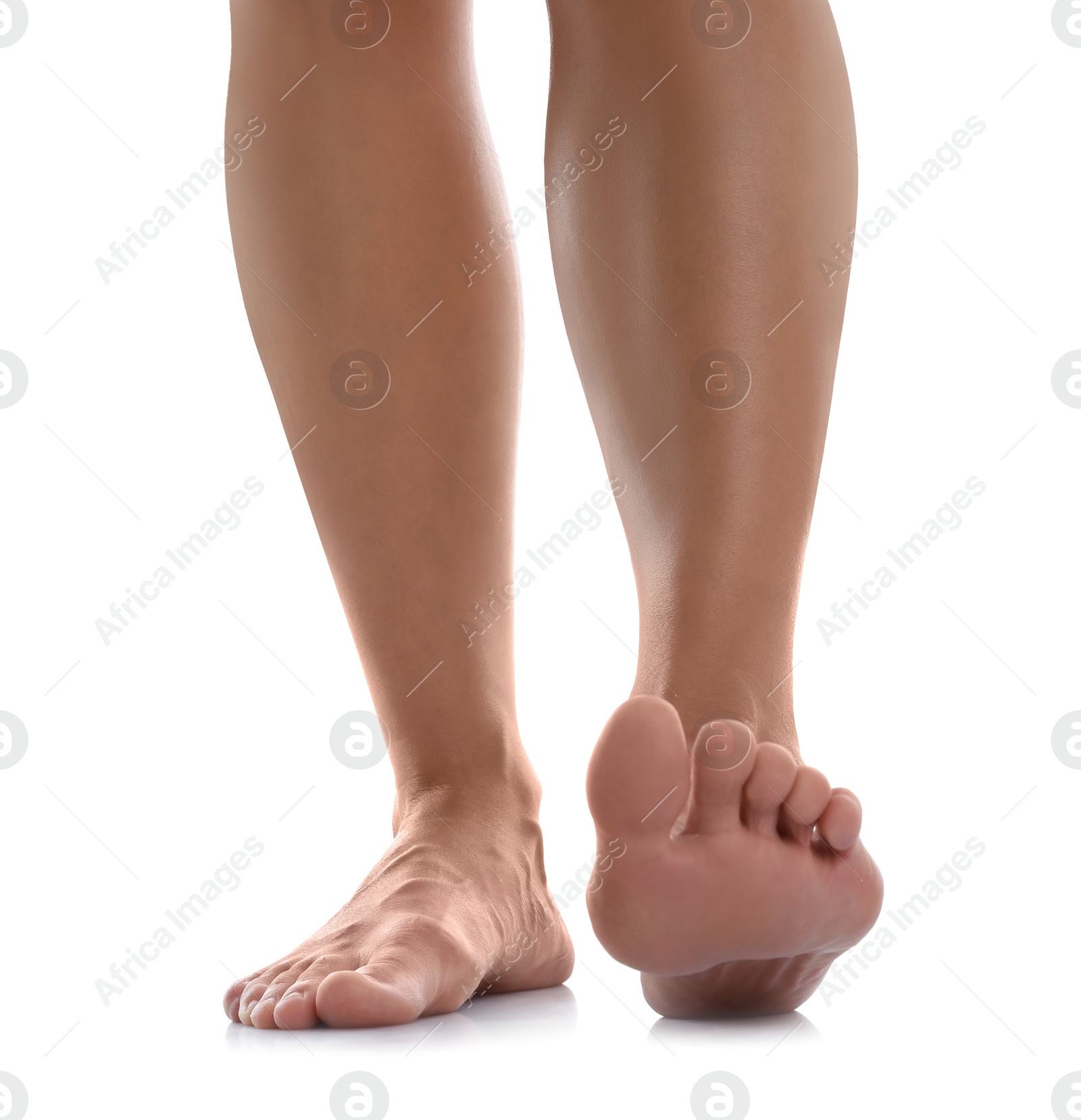 Photo of Woman standing on white background, closeup of feet