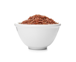 Photo of Bowl with uncooked red rice on white background