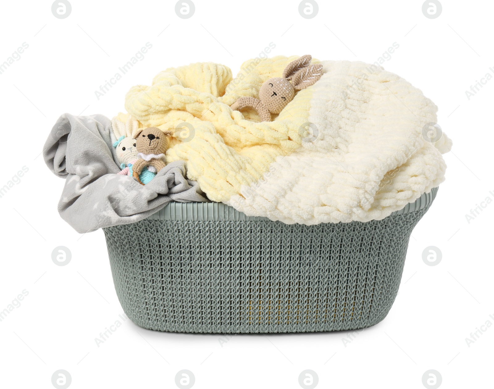 Photo of Laundry basket with baby clothes and toys isolated on white