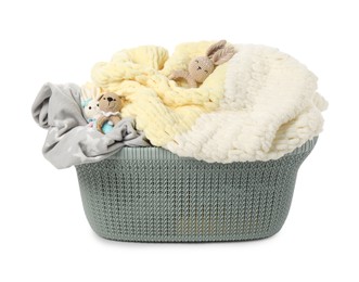 Photo of Laundry basket with baby clothes and toys isolated on white