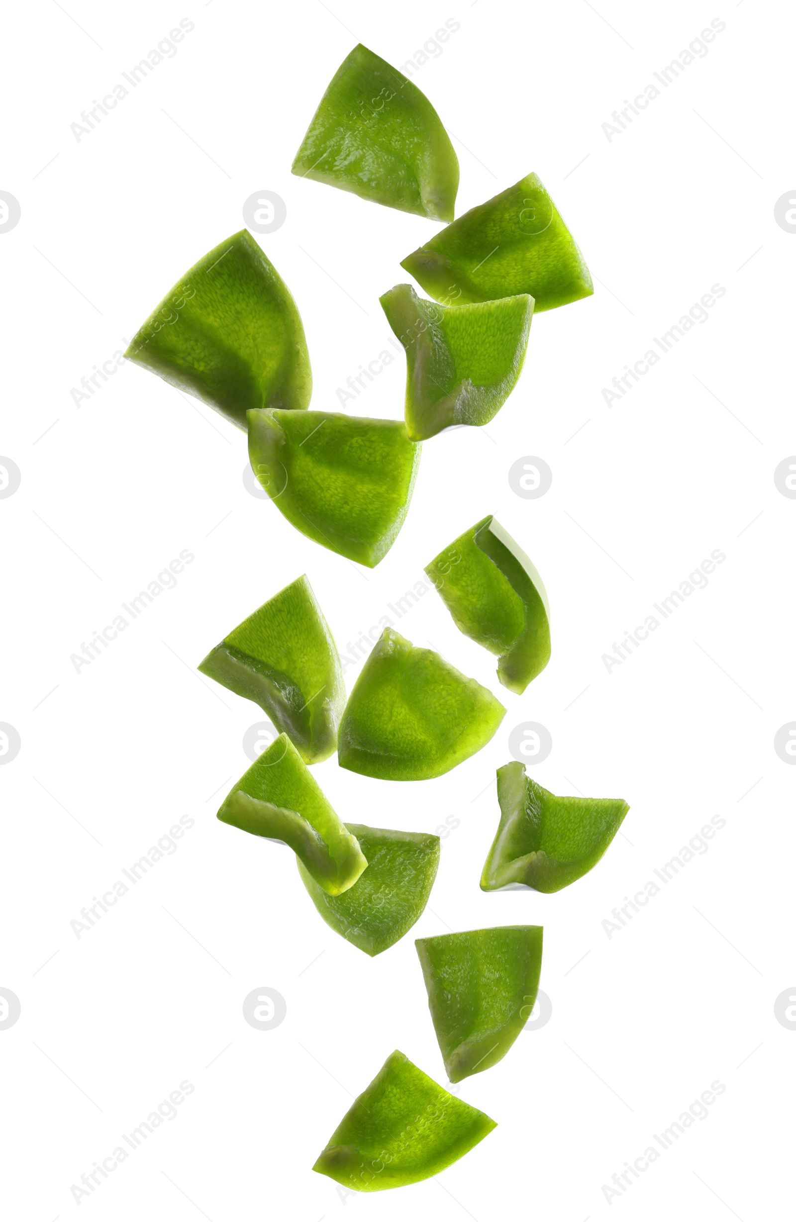 Image of Falling ripe green bell peppers on white background