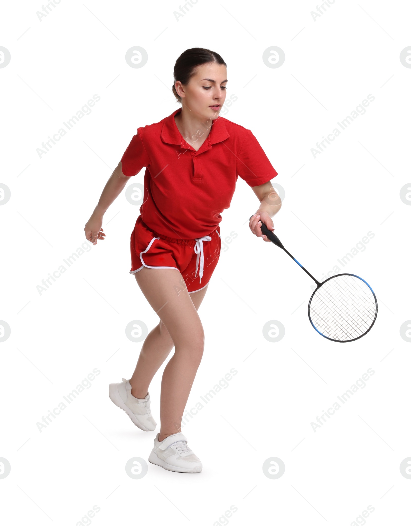 Photo of Young woman playing badminton with racket on white background