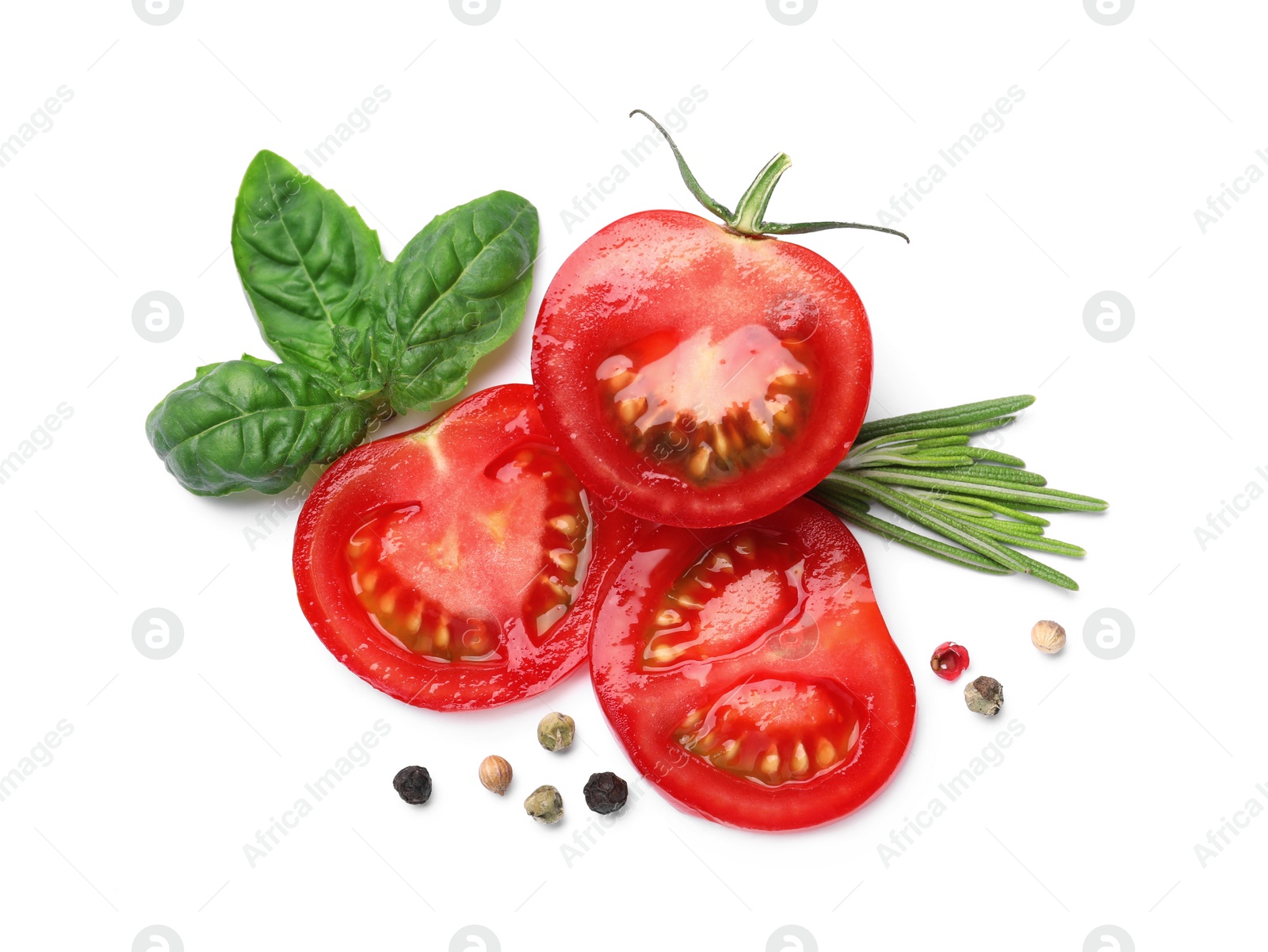 Photo of Fresh green basil leaves, spices with cut tomato on white background, top view