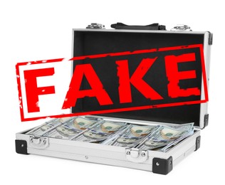 Image of Open metal case full of fake money on white background