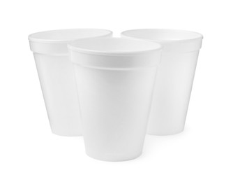 Photo of Three clean styrofoam cups on white background
