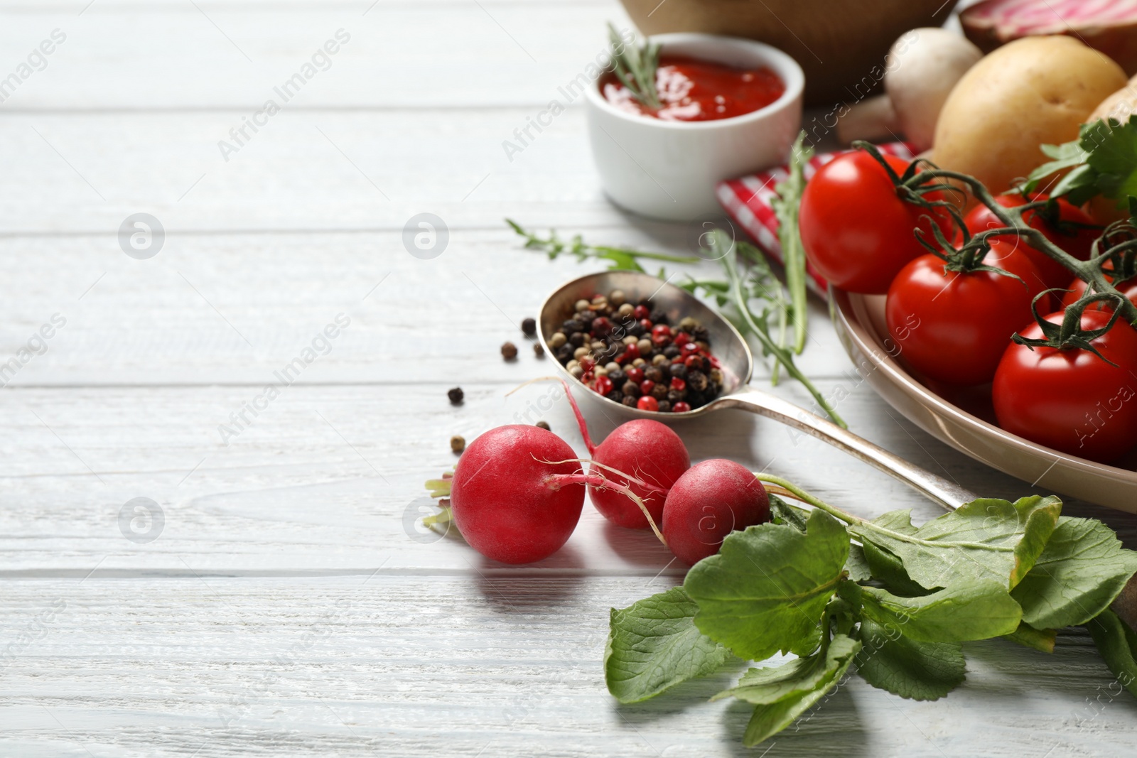 Photo of Fresh products on white wooden table, space for text. Healthy cooking