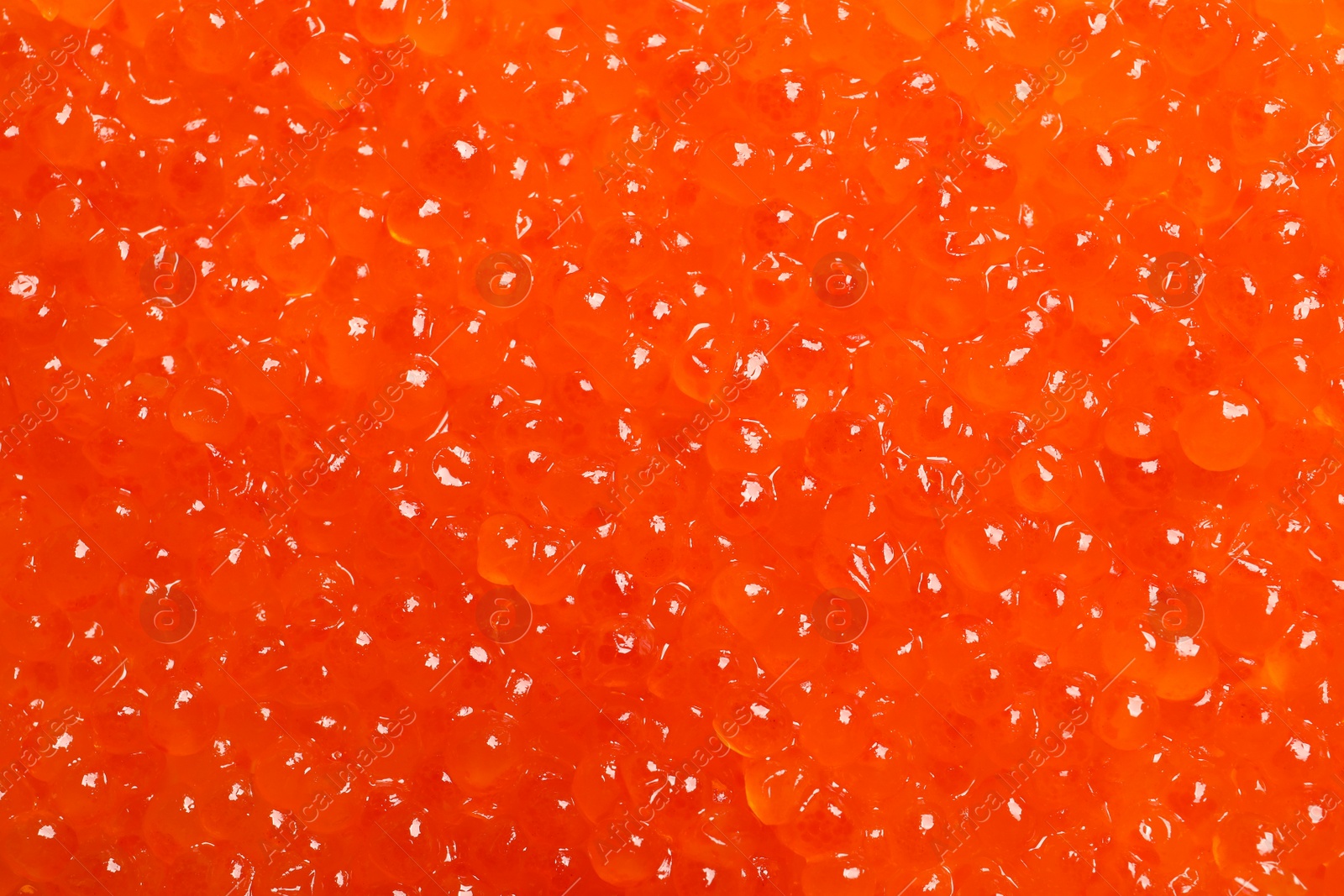 Photo of Delicious red caviar, closeup