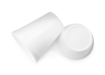 Styrofoam cups on white background, top view