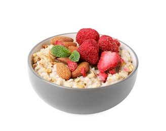 Photo of Delicious oatmeal with freeze dried strawberries, almonds and mint isolated on white