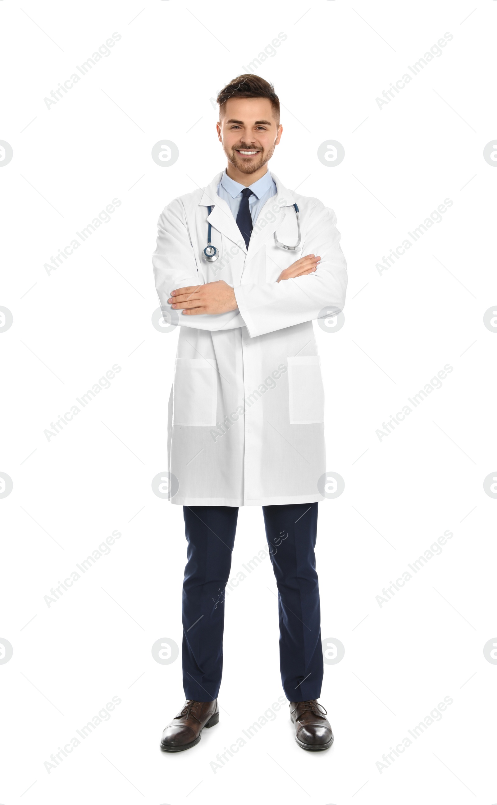 Photo of Full length portrait of medical doctor with stethoscope isolated on white