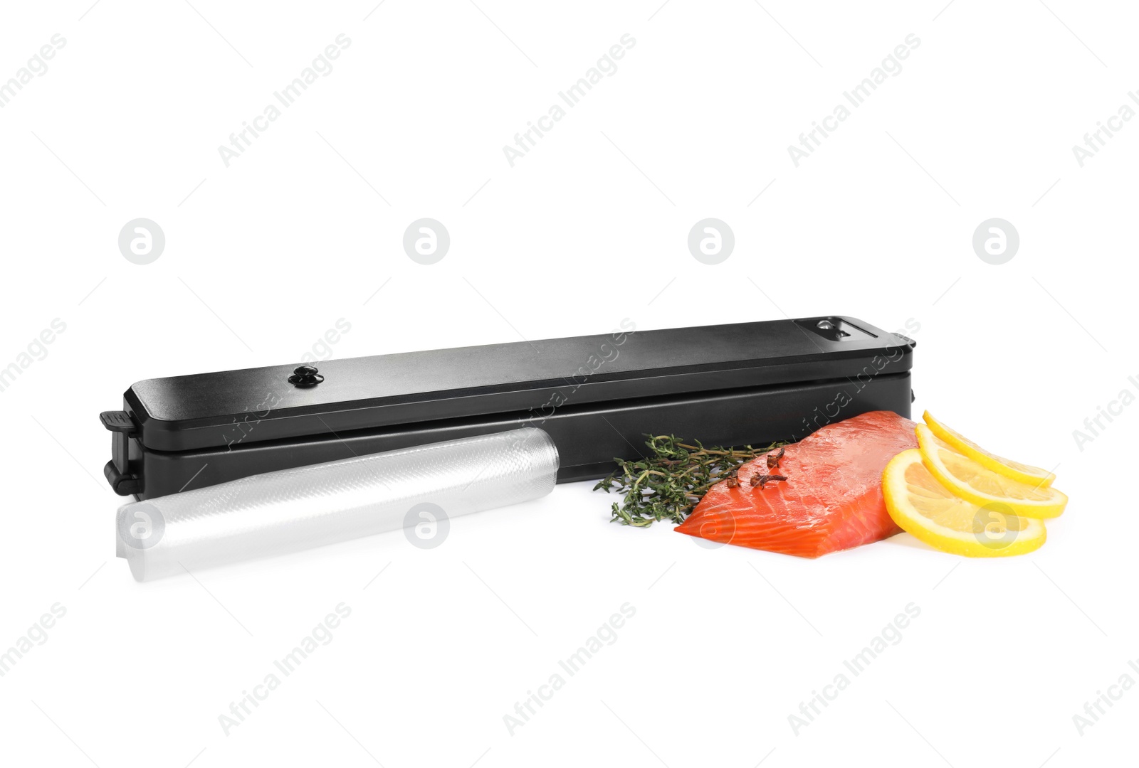 Photo of Sealer for vacuum packing, plastic bag and salmon with ingredients on white background