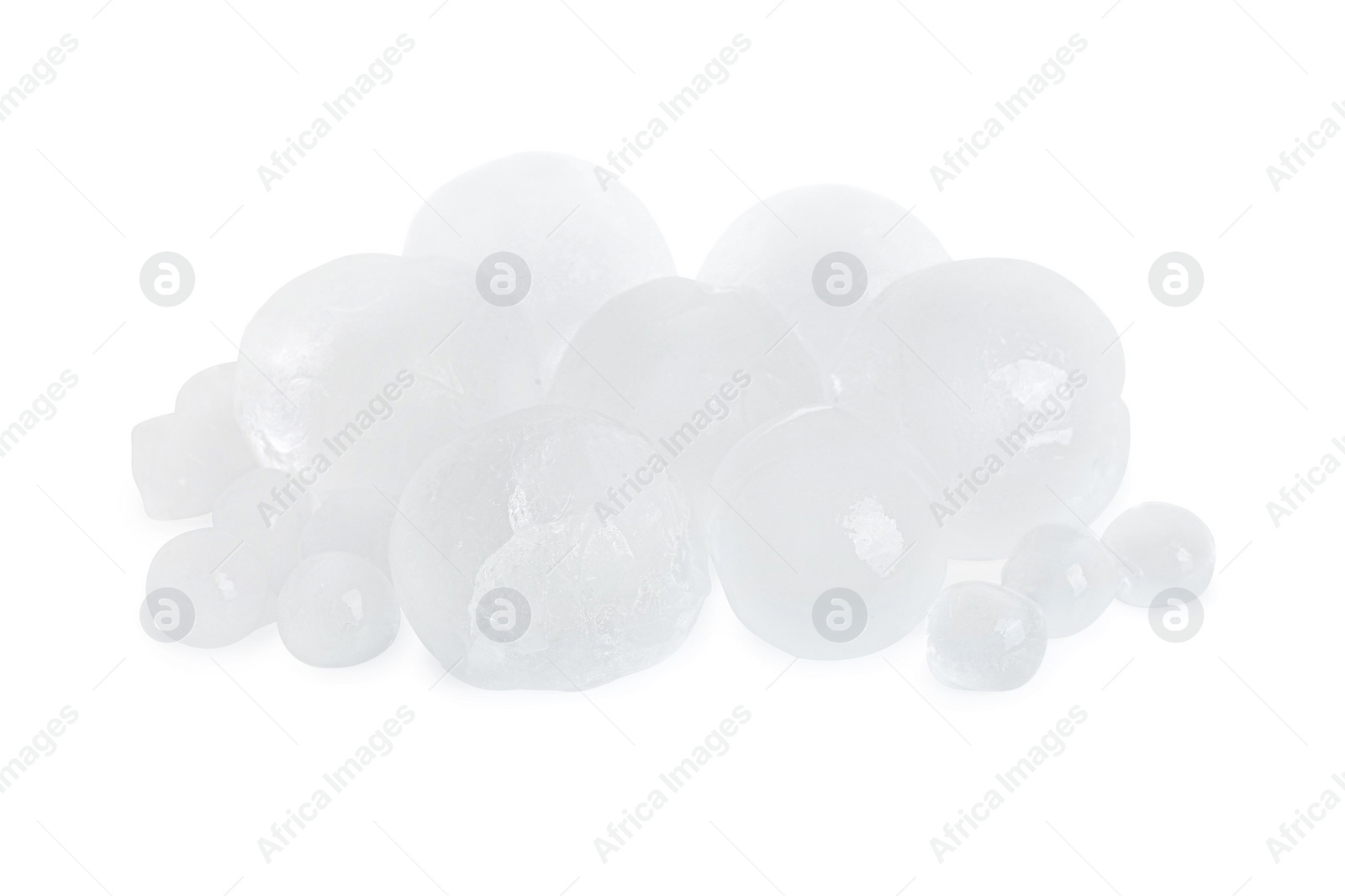 Photo of Many frozen ice balls on white background