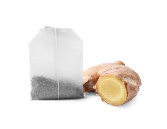 Photo of Tea bag and ginger on white background