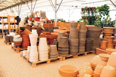 Many different flower pots in gardening shop