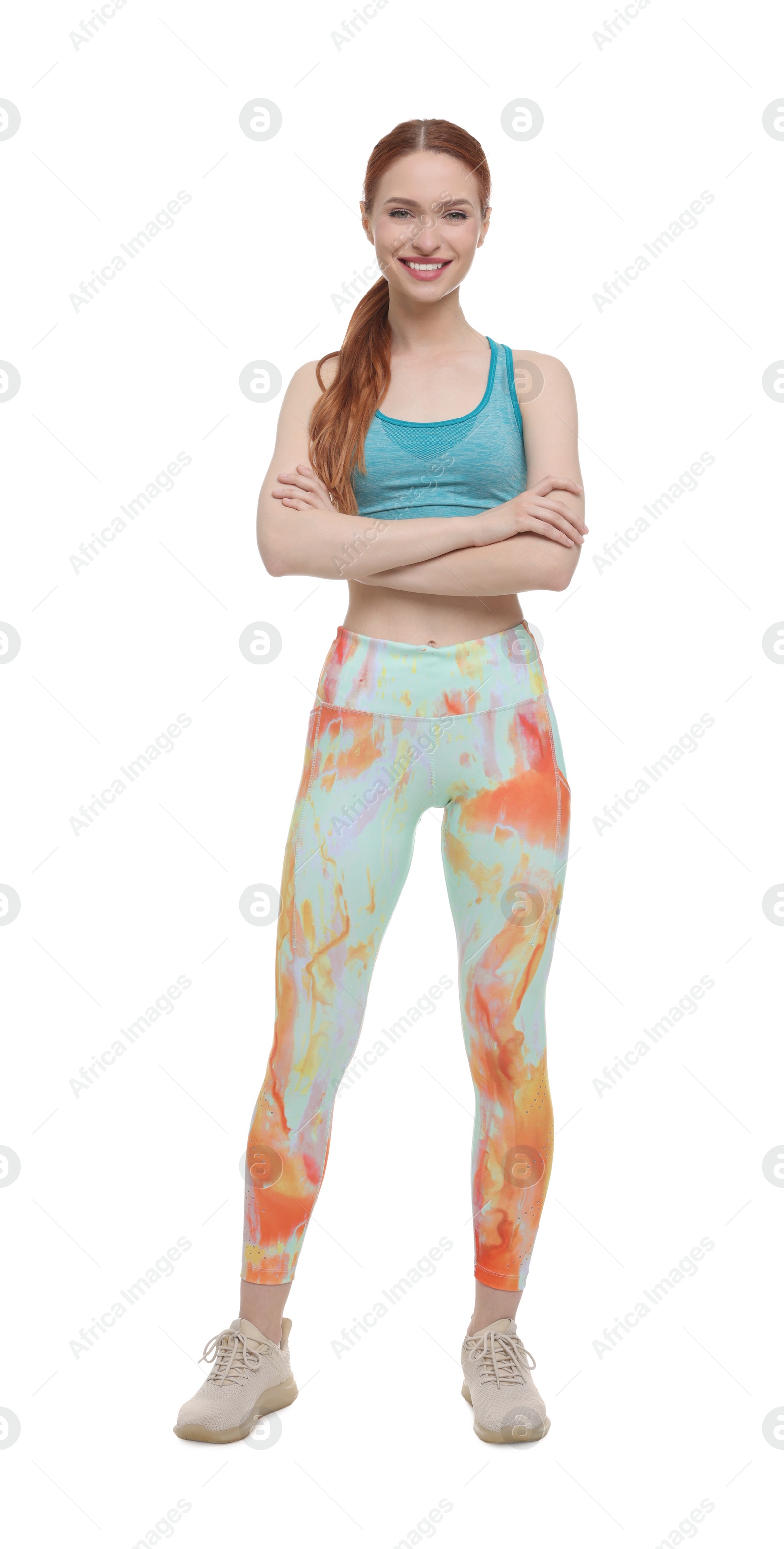 Photo of Young woman wearing sportswear on white background