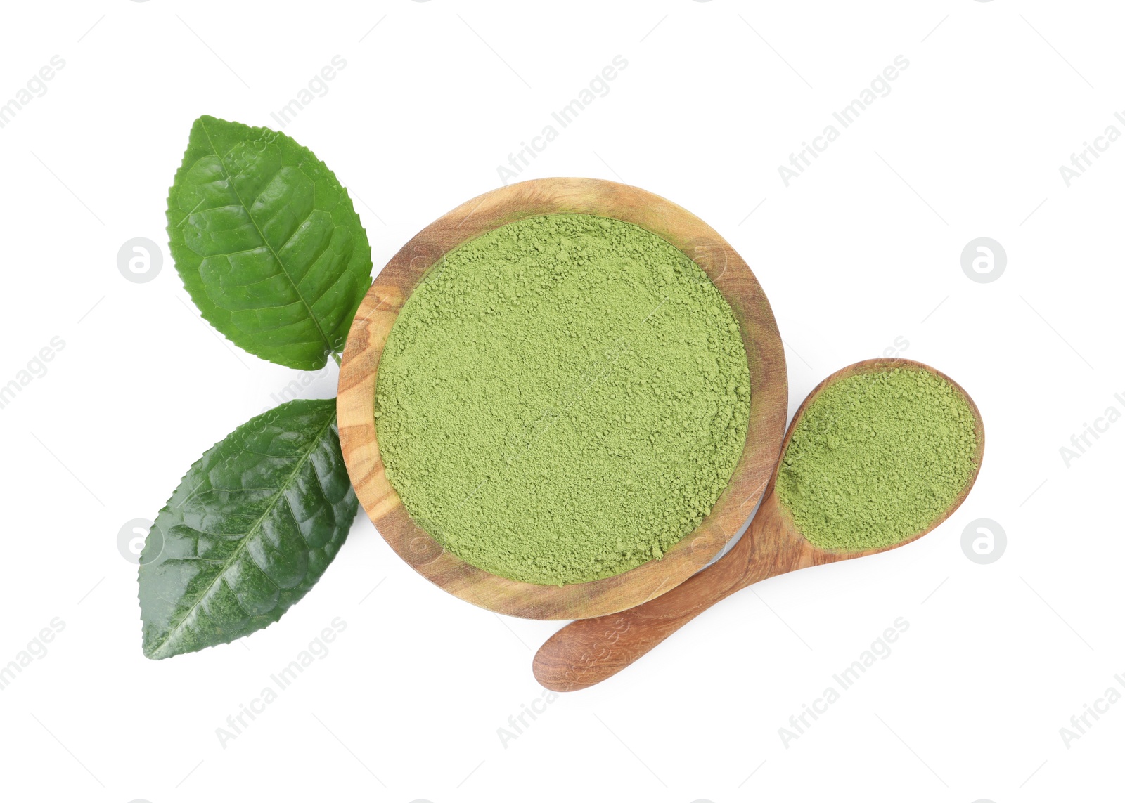Photo of Bowl and spoon with matcha powder isolated on white, top view