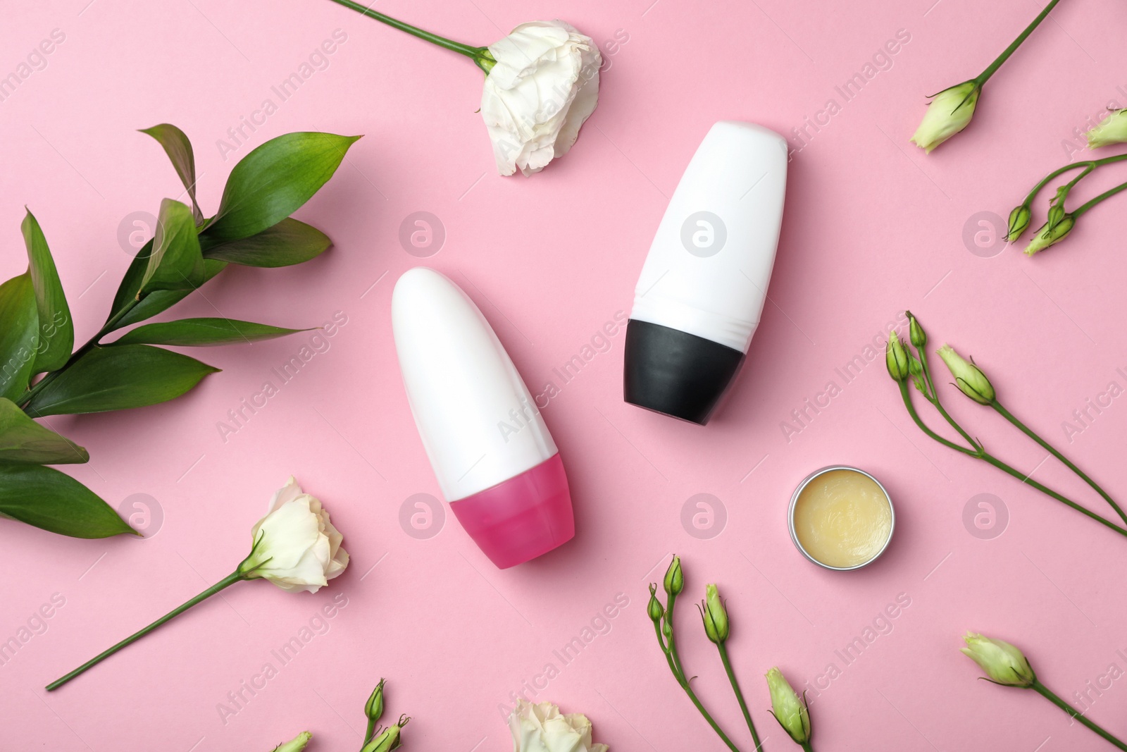 Photo of Flat lay composition with different deodorants on color background