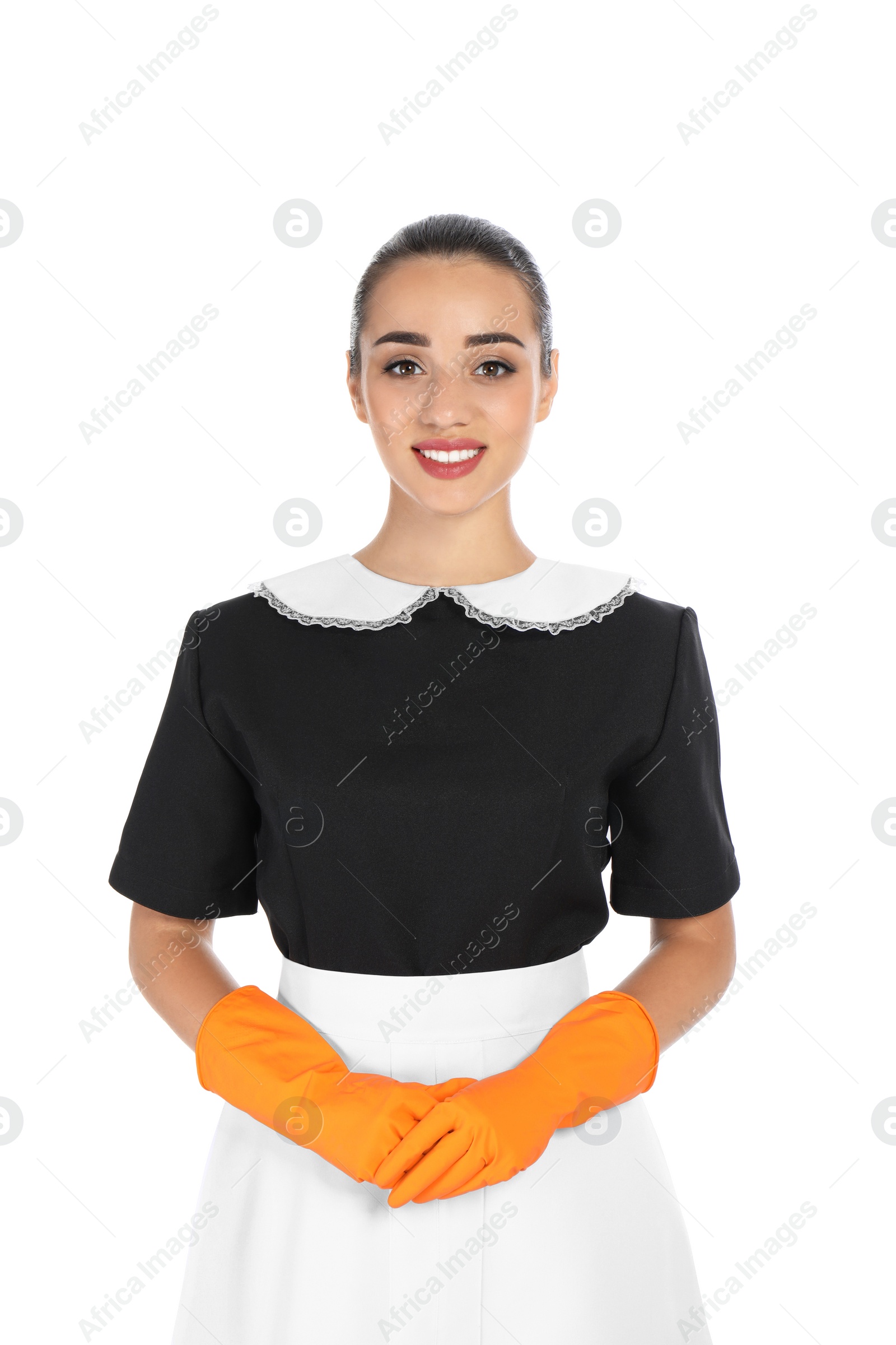 Photo of Portrait of young chambermaid in tidy uniform on white background