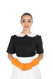 Portrait of young chambermaid in tidy uniform on white background