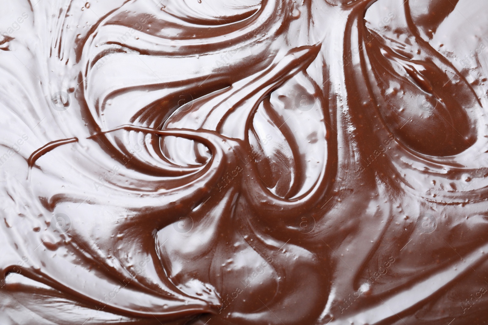 Photo of Delicious chocolate cream as background, closeup view