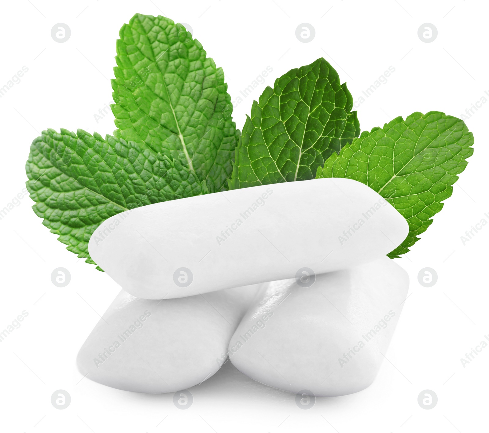 Image of Menthol chewing gum pillows and mint leaves on white background