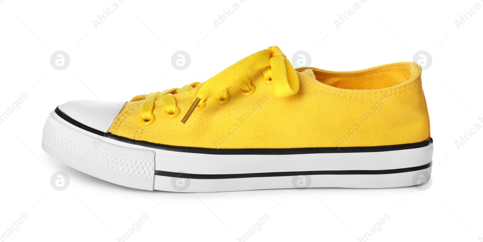 Photo of One sneaker isolated on white. Trendy shoes