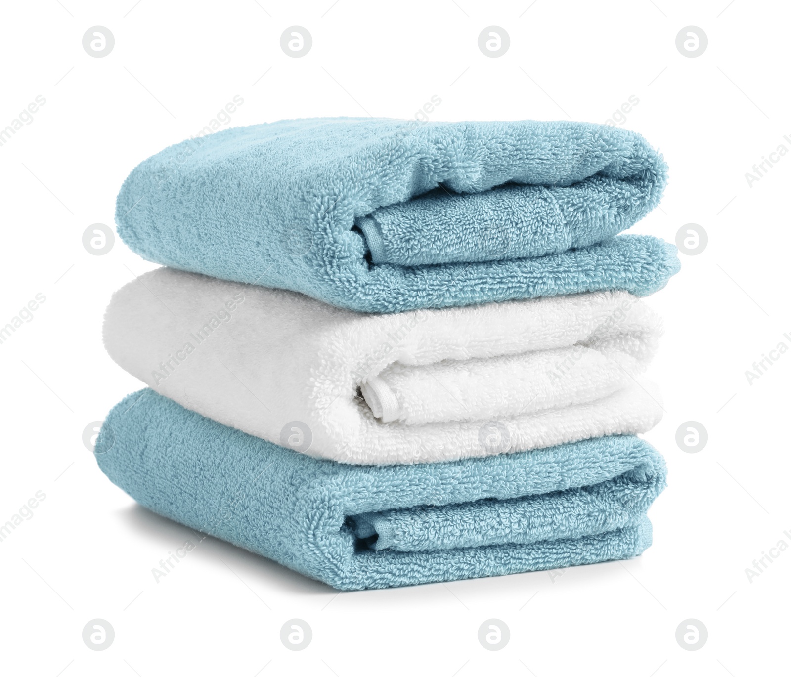 Photo of Stack of clean soft towels on white background