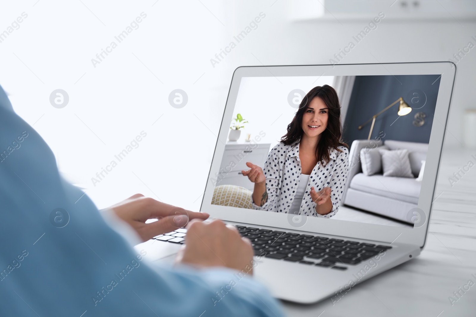 Image of Coworkers working together online. Woman using video chat on laptop, closeup