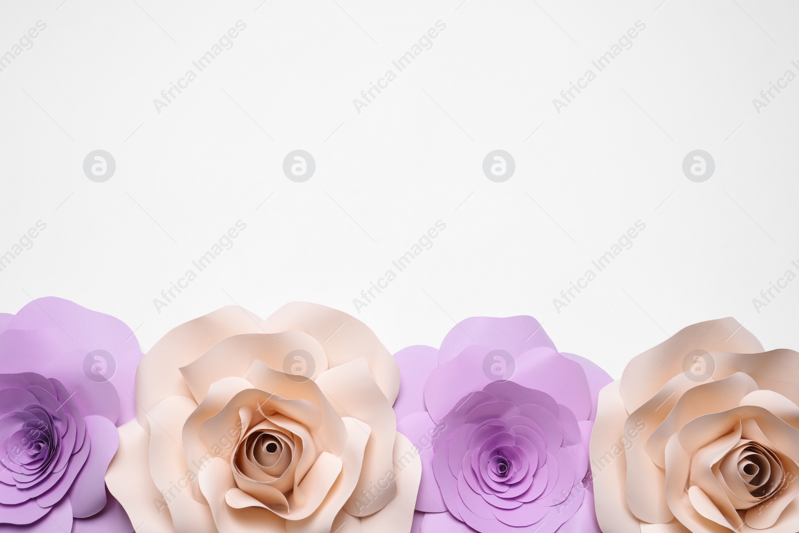 Photo of Different beautiful flowers made of paper on white background, flat lay. Space for text