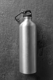 Photo of Aluminum sports water bottle on gray background