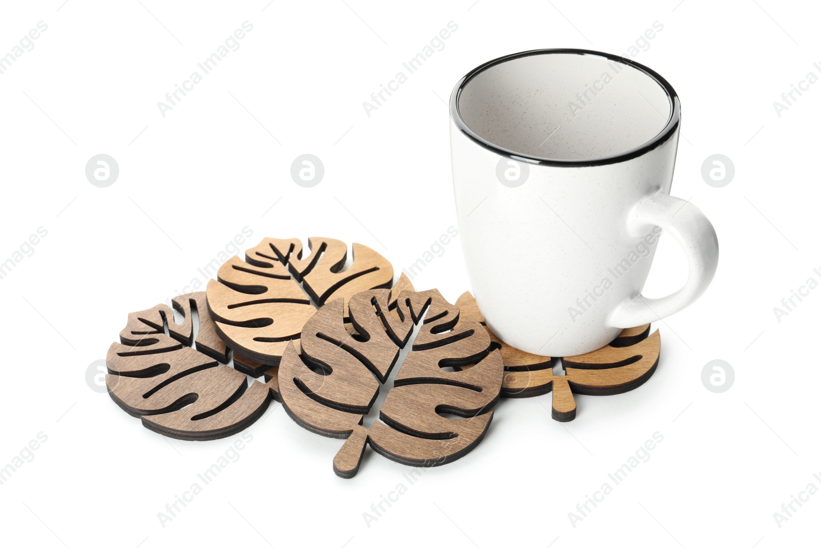 Photo of Mug and stylish wooden coasters on white background