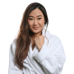 Photo of Portrait of beautiful Asian woman in bathrobe isolated on white. Spa treatment