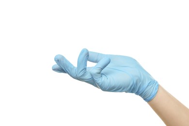 Doctor wearing light blue medical glove holding something on white background, closeup