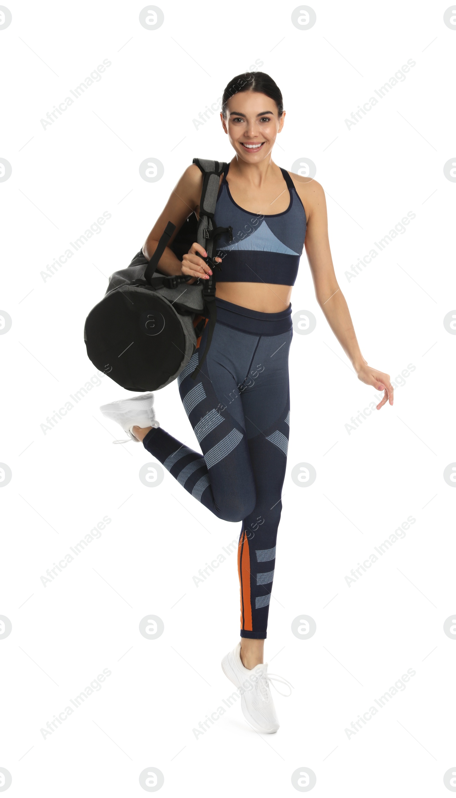 Photo of Beautiful woman with sports bag on white background