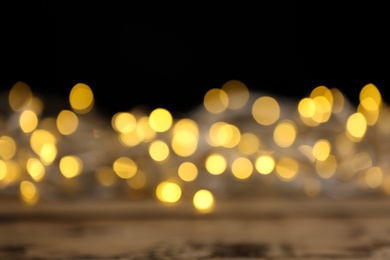 Photo of Beautiful abstract background with blurred yellow Christmas lights