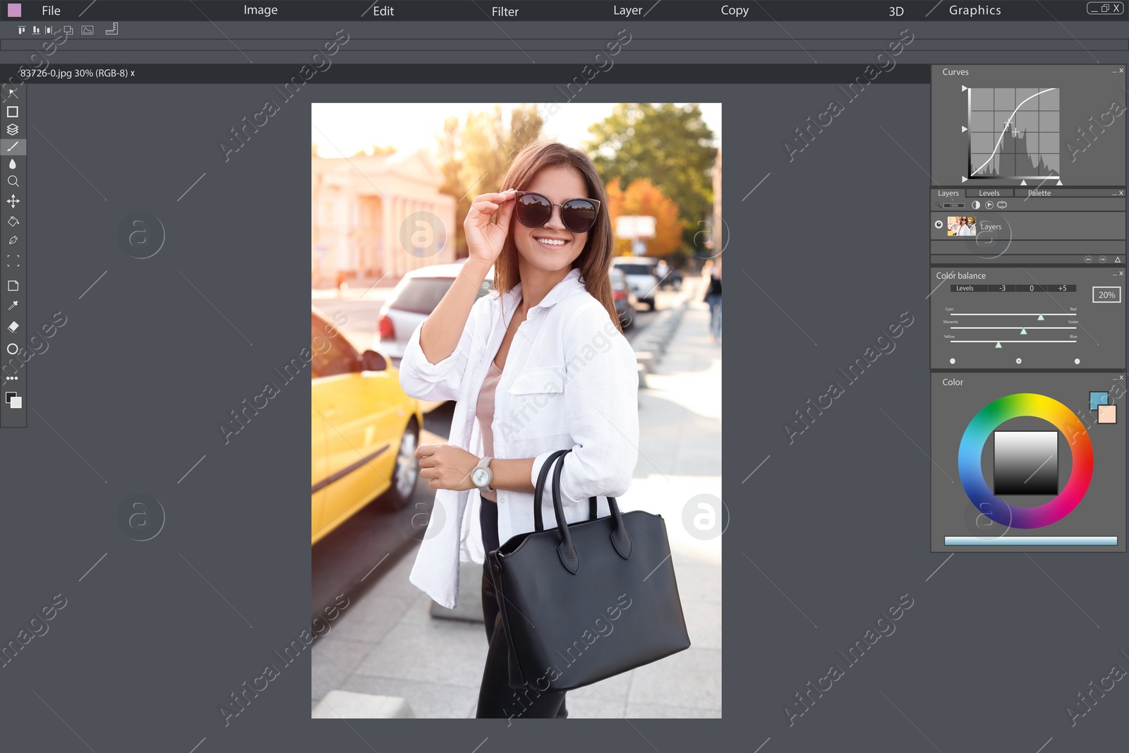 Image of Professional photo editor application.  young woman in sunglasses with stylish black bag