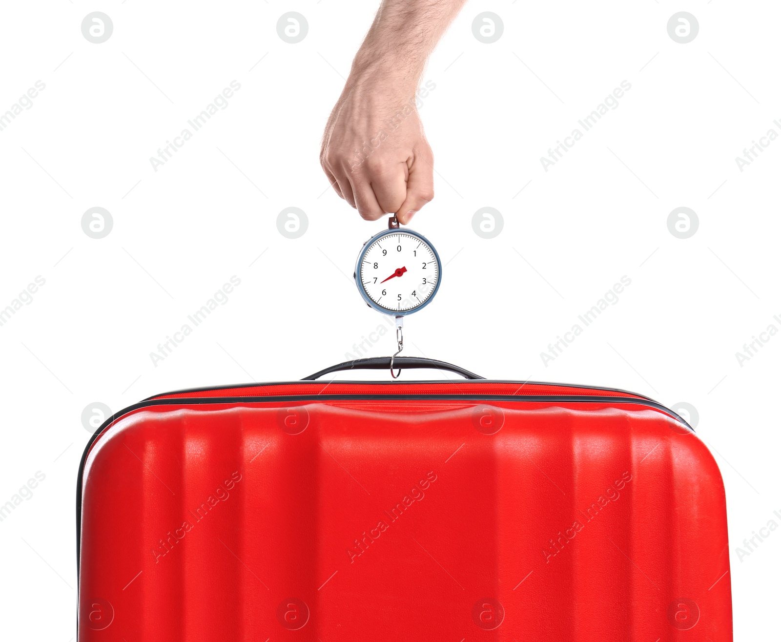 Photo of Man weighing stylish suitcase against white background, closeup