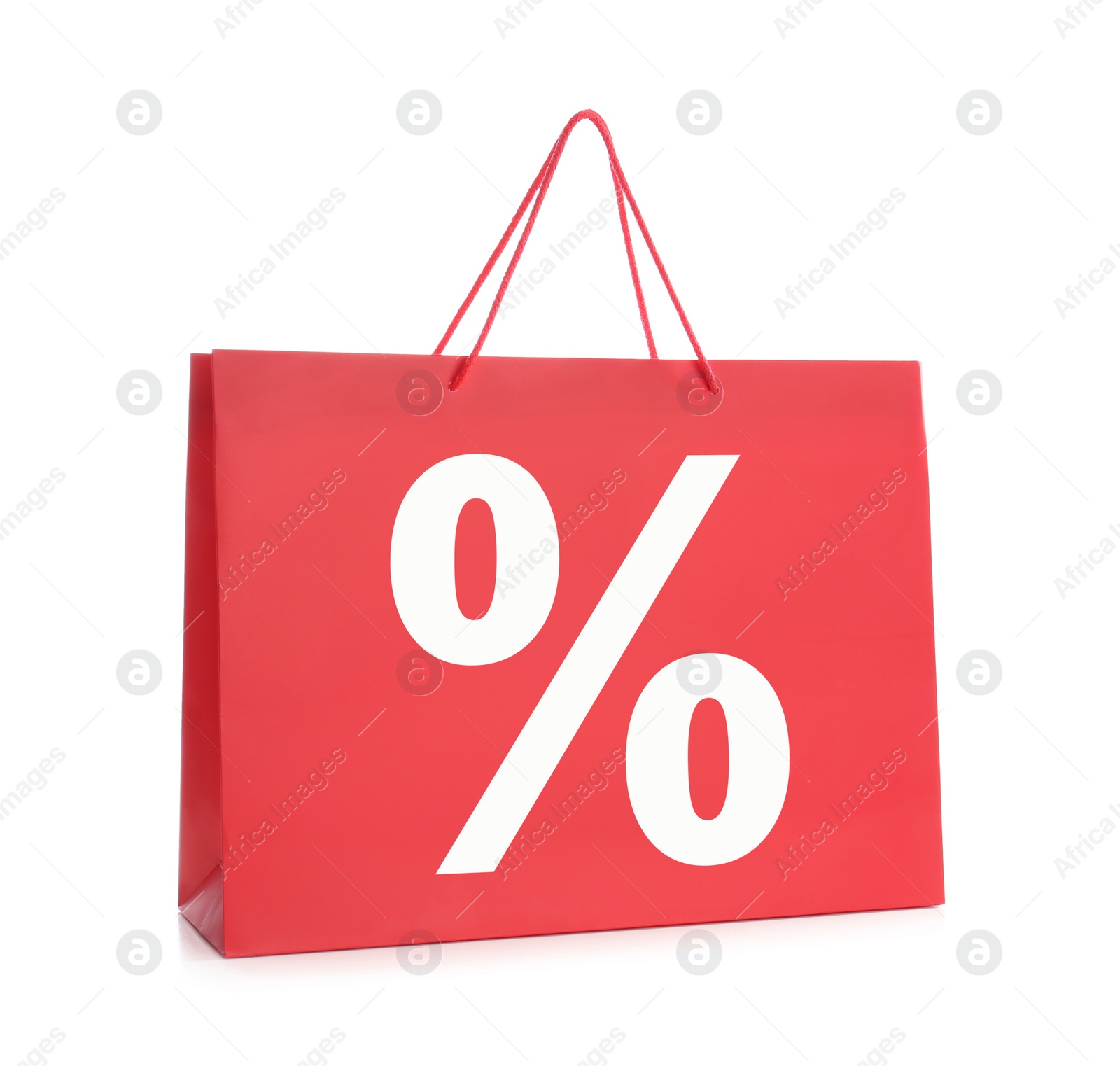Image of Red paper shopping bag with percent sign on white background. Discount concept