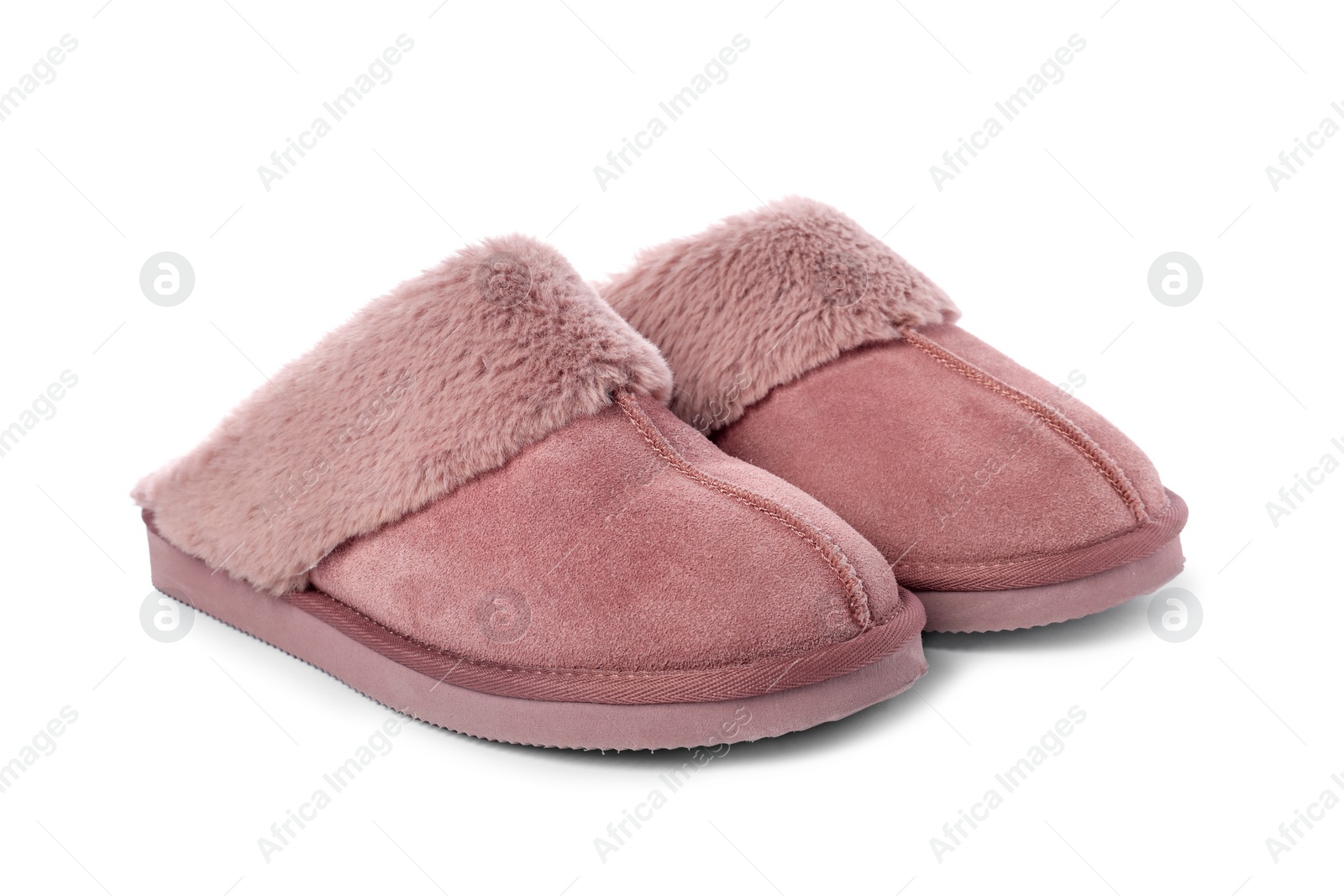 Photo of Pair of pink soft slippers isolated on white