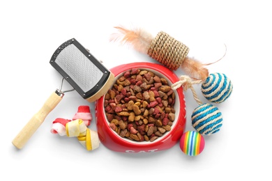 Photo of Cat's accessories and food on white background