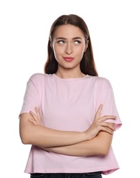 Embarrassed young woman in shirt on white background