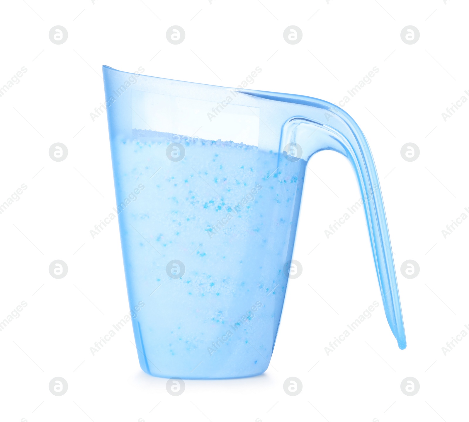 Photo of Laundry detergent in plastic measuring cup on white background